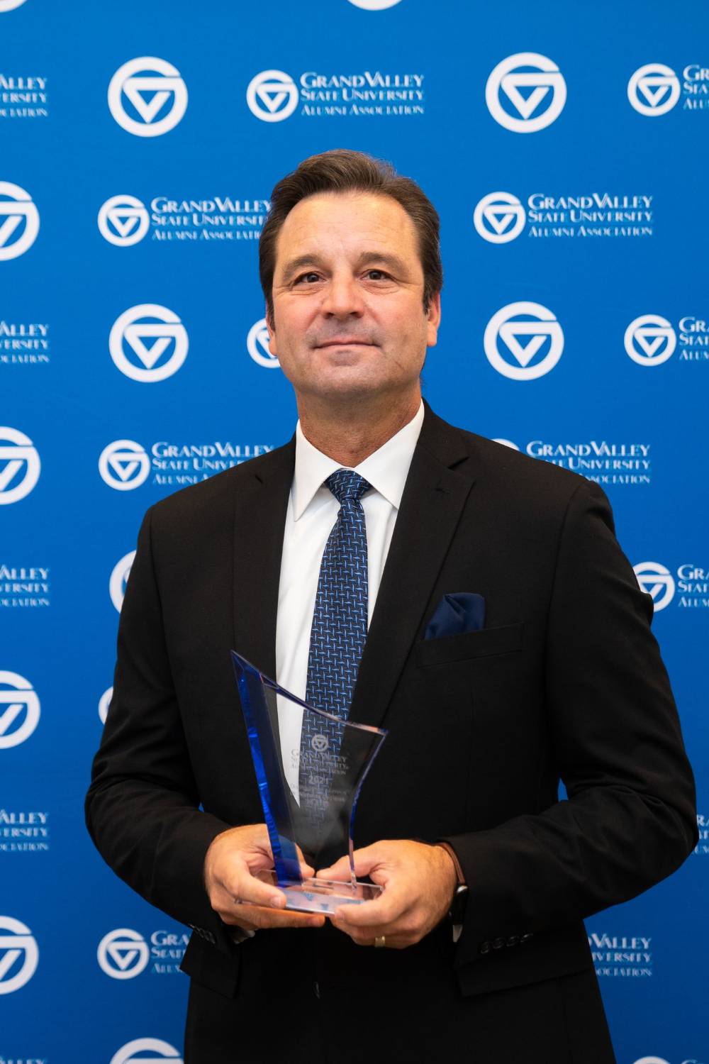 Dr. Ceglarek with award